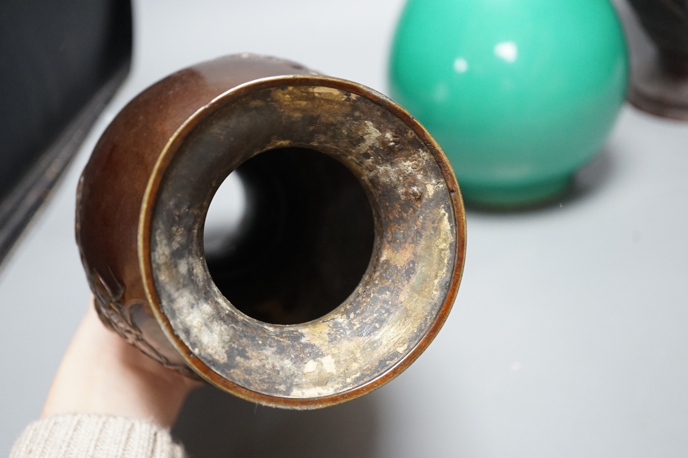 A Chinese green glazed vase with Qianlong seal mark to base and two Japanese bronze vases, tallest 29.5cm